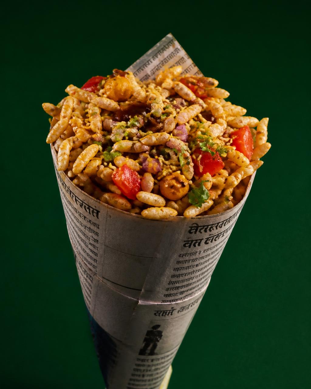 Street-style spicy bhel puri with tamarind chutney and fresh coriander